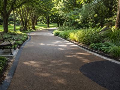 Rubber surfaced walking path through a public park